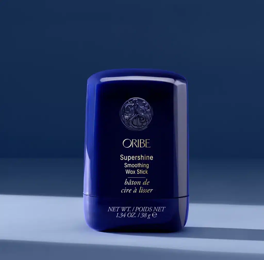 Oribe Supershine Smoothing Wax Stick plaukų formavimo vaško pieštukas, 38 g